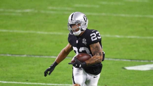 Dec 26, 2020; Paradise, Nevada, USA; Las Vegas Raiders running back Devontae Booker (23) against the Miami Dolphins at Allegiant Stadium.